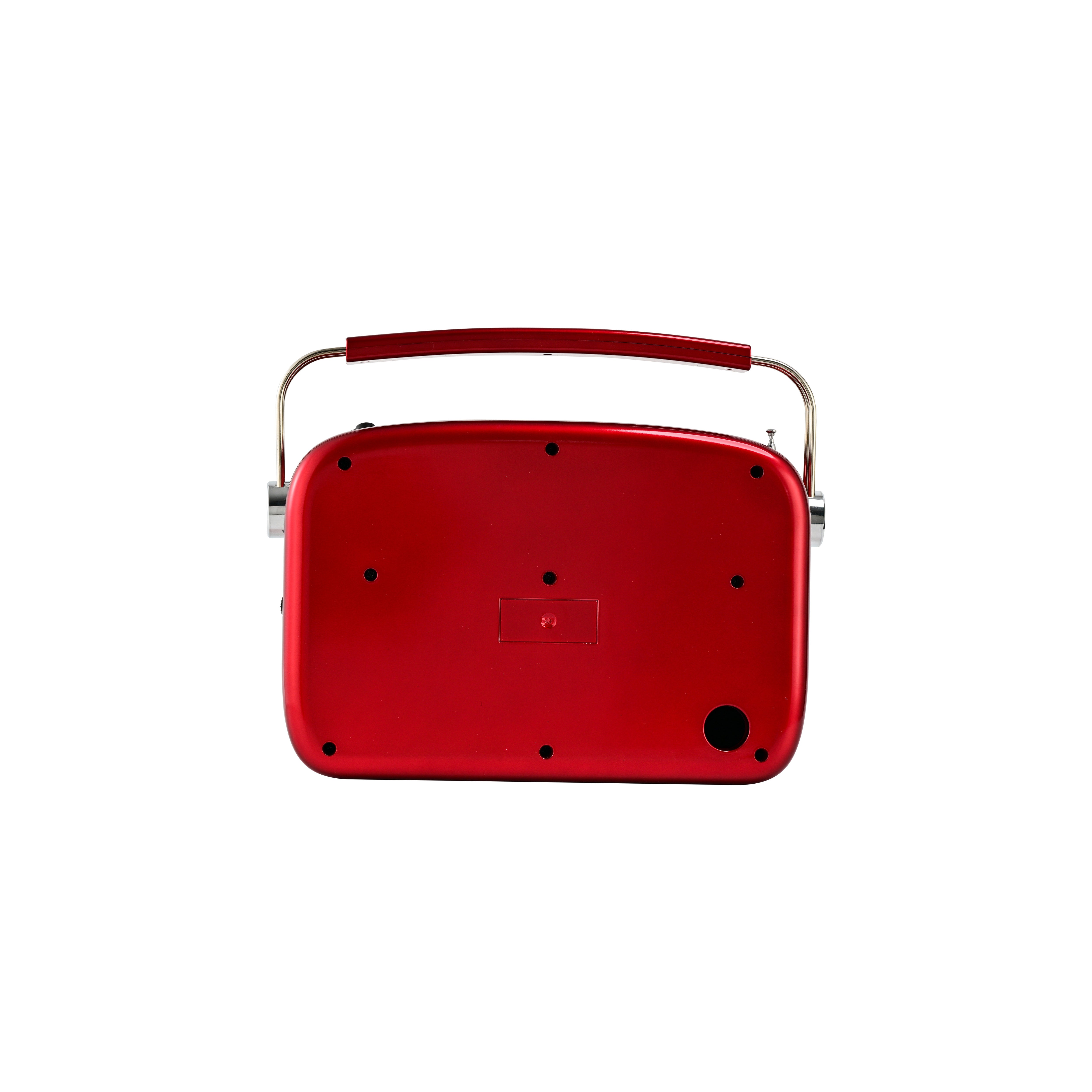 Back of the red portable radio showing input ports and battery cover